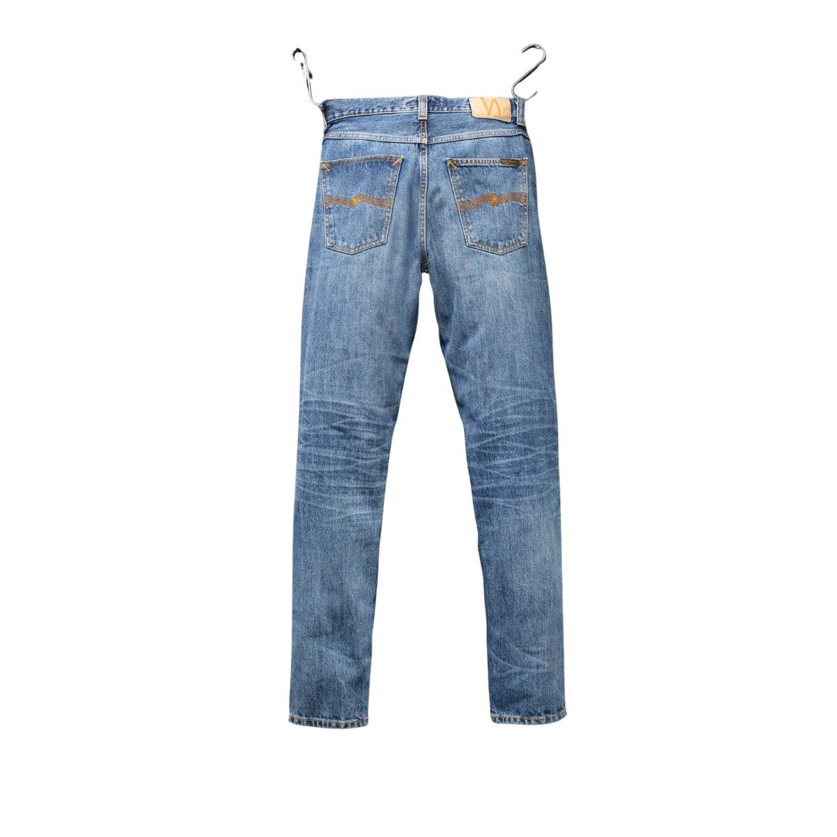 product/n/u/nudie-jeans_115042_raw-tracks_2.jpg