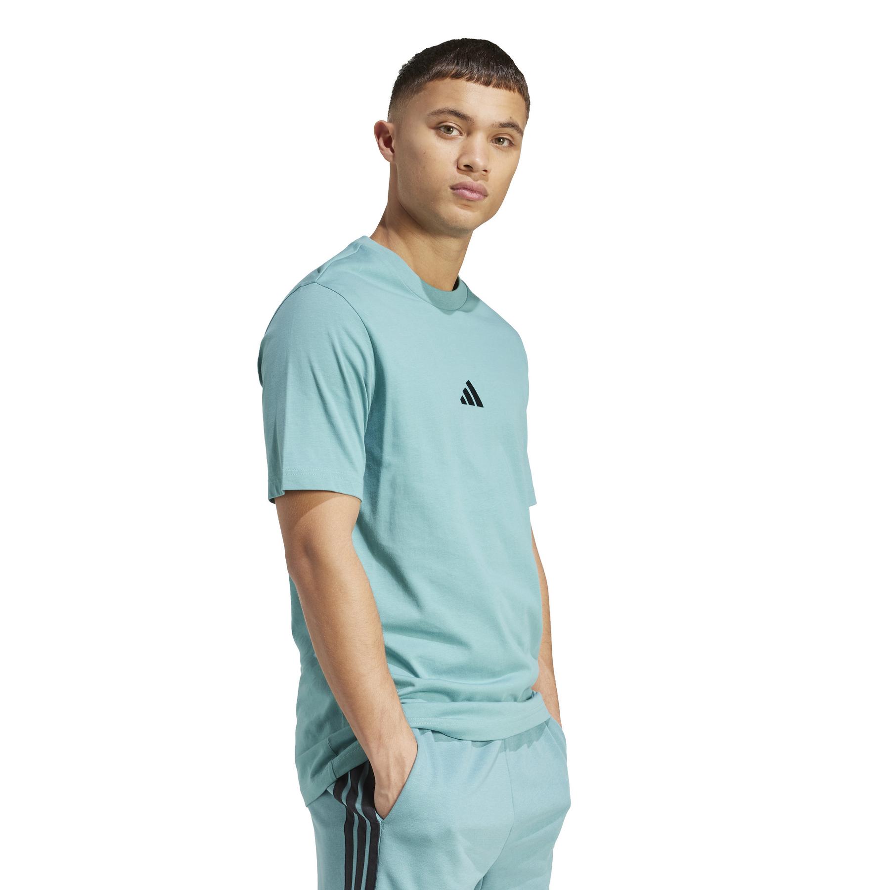product/2/0/2025_adidas_jx5653_4_apparel_on_model_walking_view_white.jpg