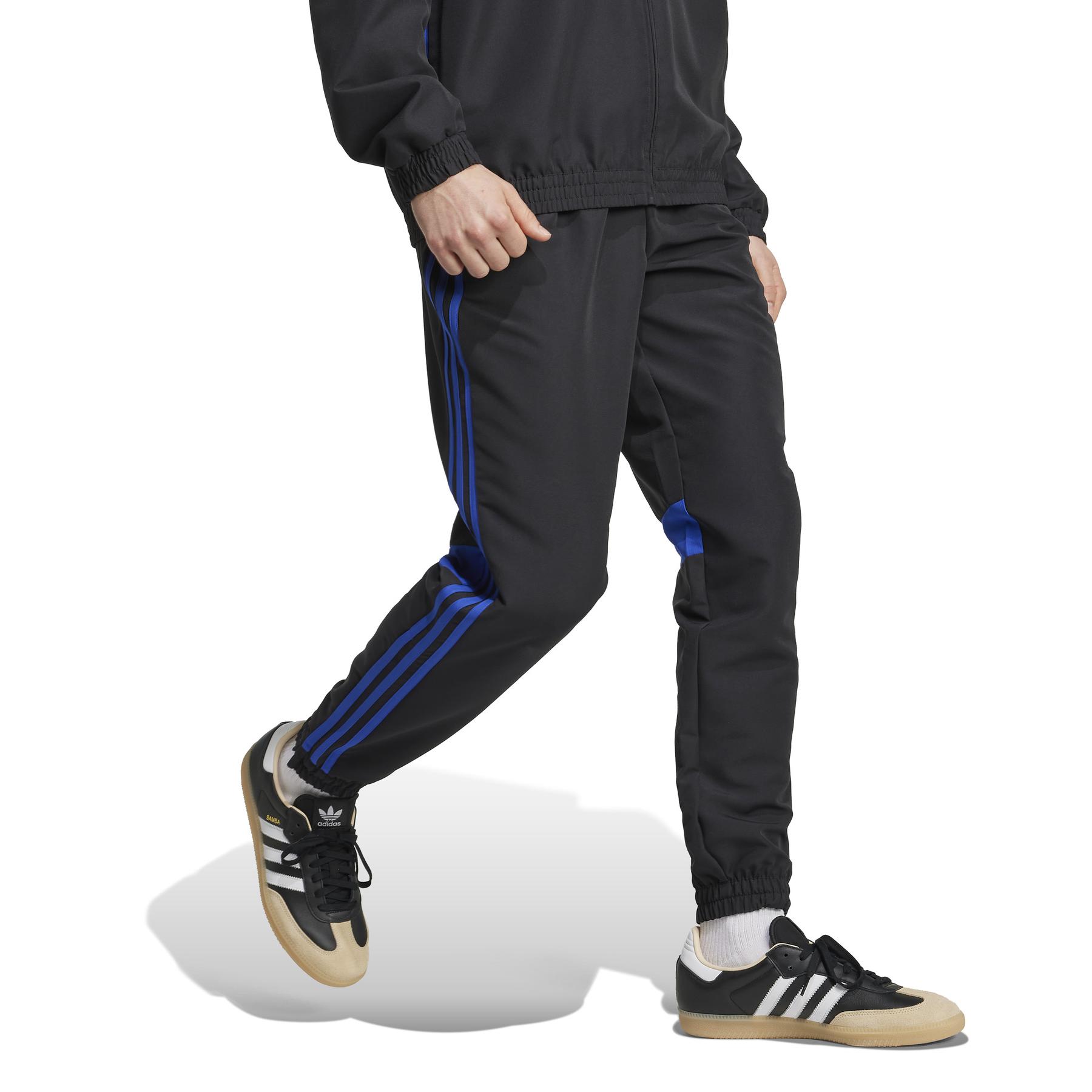 product/a/d/adidas_jx2224_4_apparel_on_model_walking_view_white.jpg