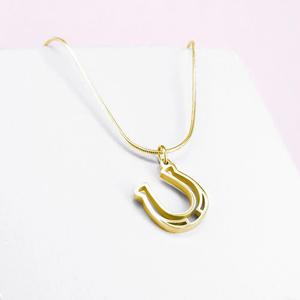 pt-pe-04-hw-gp-00-xx-pendentif-fer-a-cheval-femme-ponytail-co-gold-tu